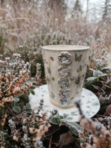 Võluaia tass ja alustaldrik